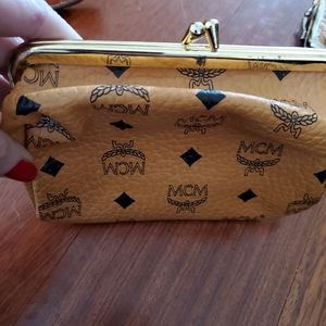 Adorable cosmetic case in MCM Logo leather.